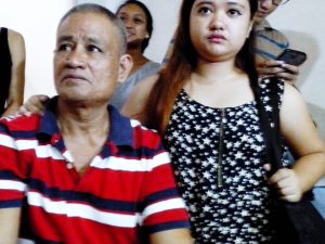 Former political prisoner and labor leader Isidro de Lima attends the Pilgrims for Peace forum