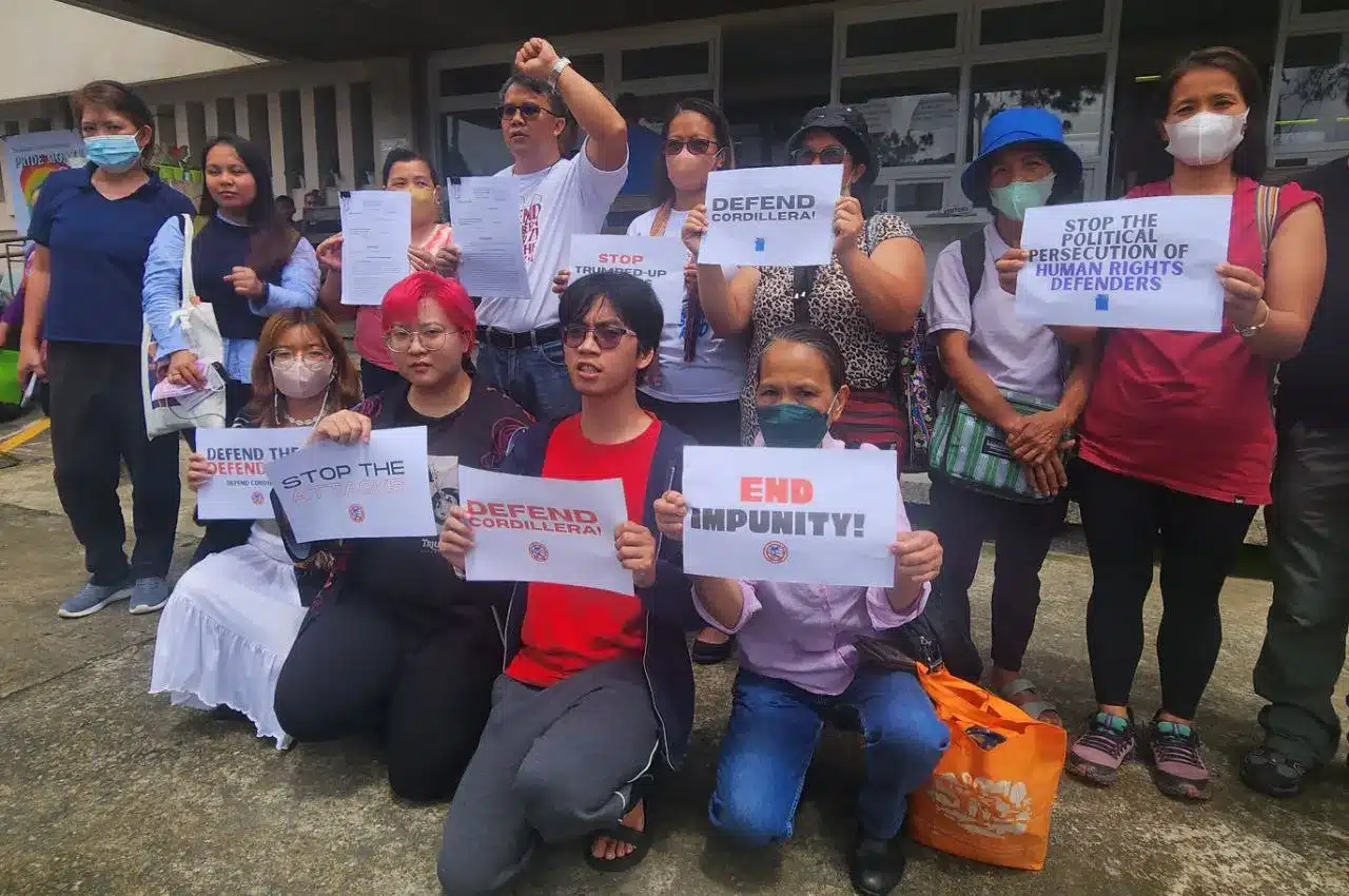 Activists in the Cordillera continue to push back against what they perceived as political persecution, this time suing police officials and a witness for a murder charge against a leader of the Cordillera People Alliance (CPA).